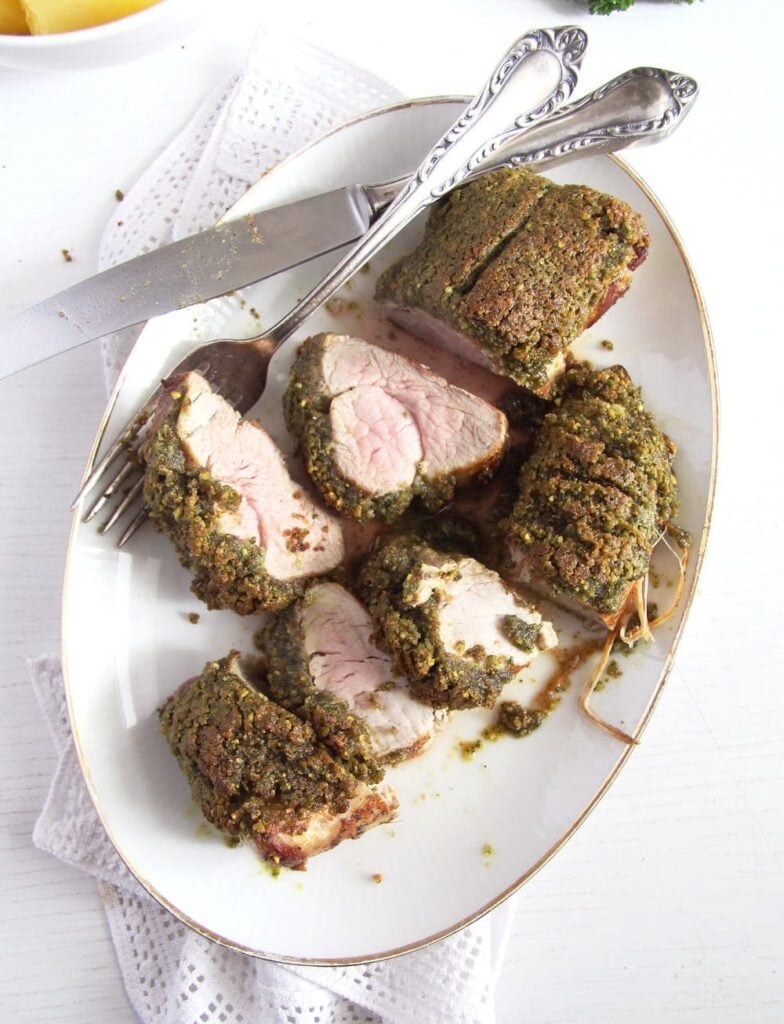 pistachio crusted tenderloin with herbs seen from above