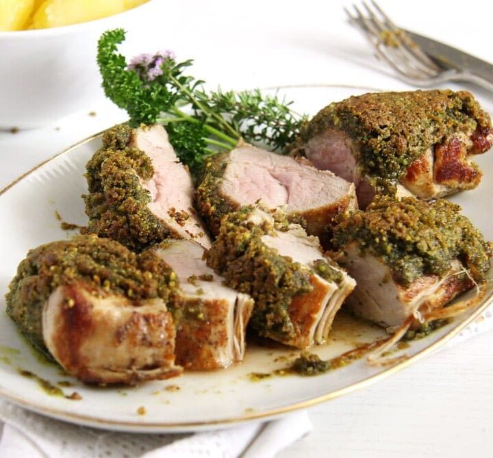 pistachio crusted pork tenderloin slightly pink in the middle