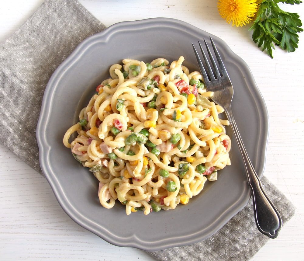 german pasta salad on a grey plate