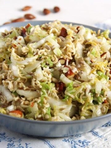 asian cabbage salad with ramen noodles in a grey bowl