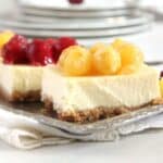 philadelphia cream cheese cherry cheesecake bars on a platter.