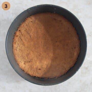 baked graham crust cheesecake in a springform. 