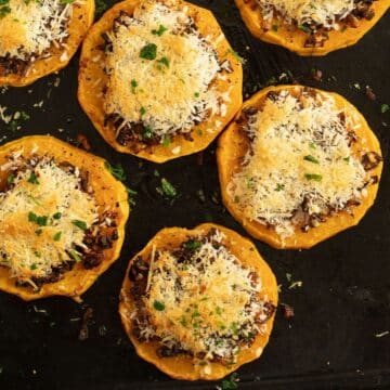 roasted butternut squash slices topped with mushrooms and parmesan.