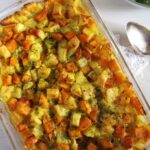potato and pumpkin bake in a baking dish on the table