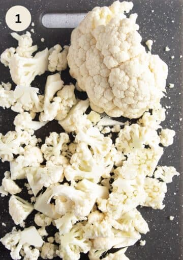 choppedd cauliflower on a cutting board.