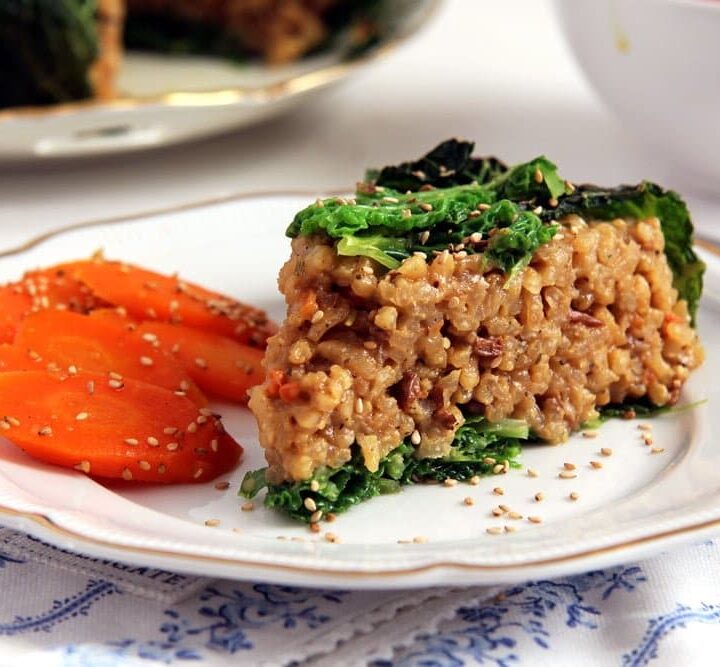 slice of stuffed cabbage cake filled with mushroom risotto