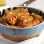 vegan cabbage rolls with rice in a bowl.