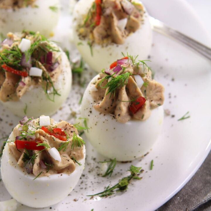 spicy eggs filled with tuna fish and capers.