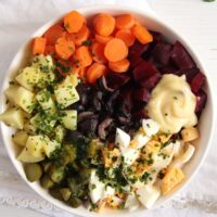 overhead view of a bowl of salad russe with mayo
