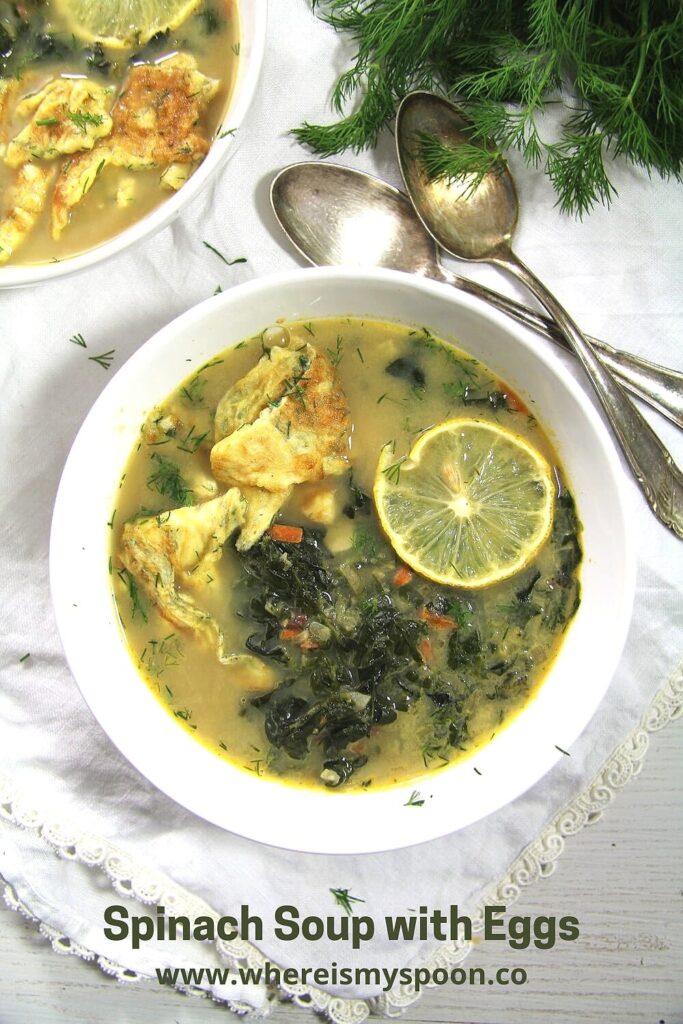 romanian soup with spinach and omelet on top