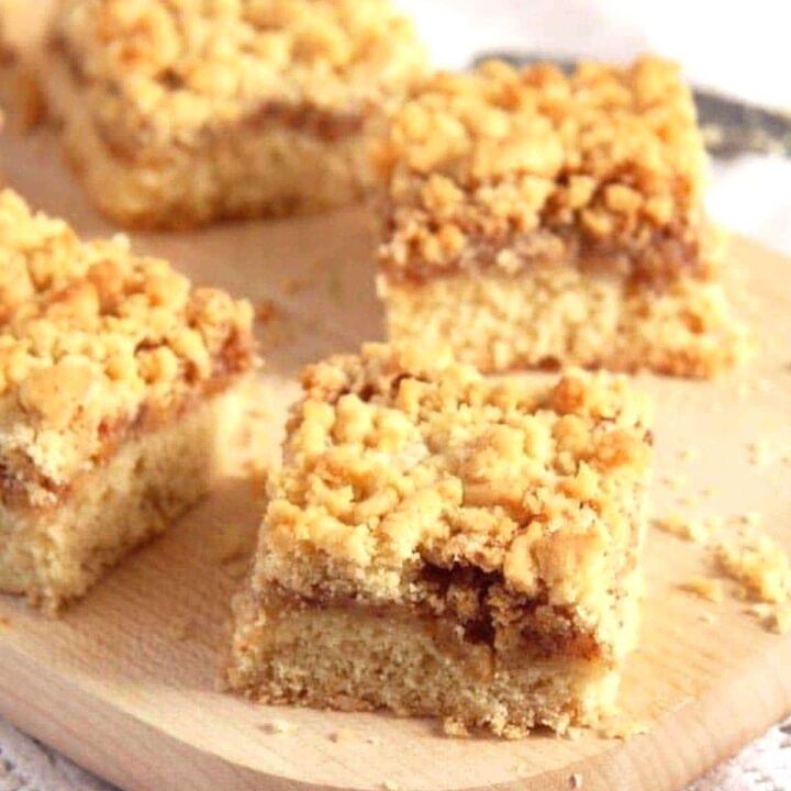 apricot jam cake with crumbles cut into squares