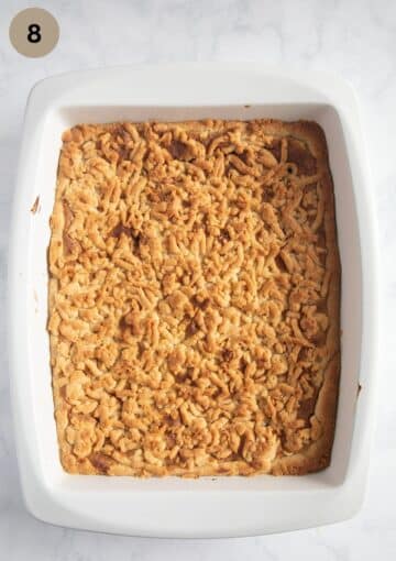 baked romanian cake prajitura razuita in a baking dish.