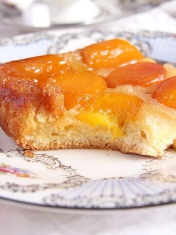eating a slice of upside down apricot cake