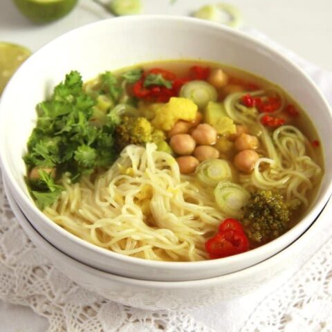turmeric vegetable soup with chickpeas in a bowl