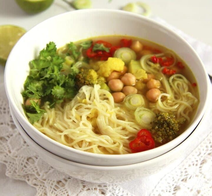 turmeric vegetable soup with chickpeas in a bowl
