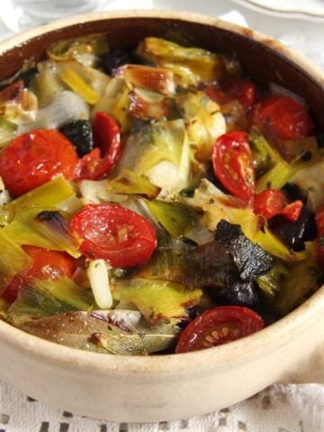 vegan leek stew with olives in a small pot