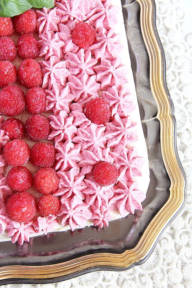 raspberry cheesecake on a vintage silver platter