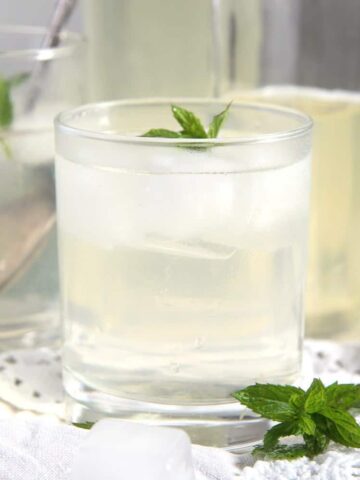 close up with lemon mint syrup on ice