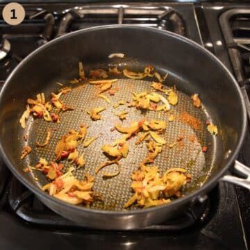 sauteing sliced onions, chopped chili, grated garlic and ginger in a saucepan.