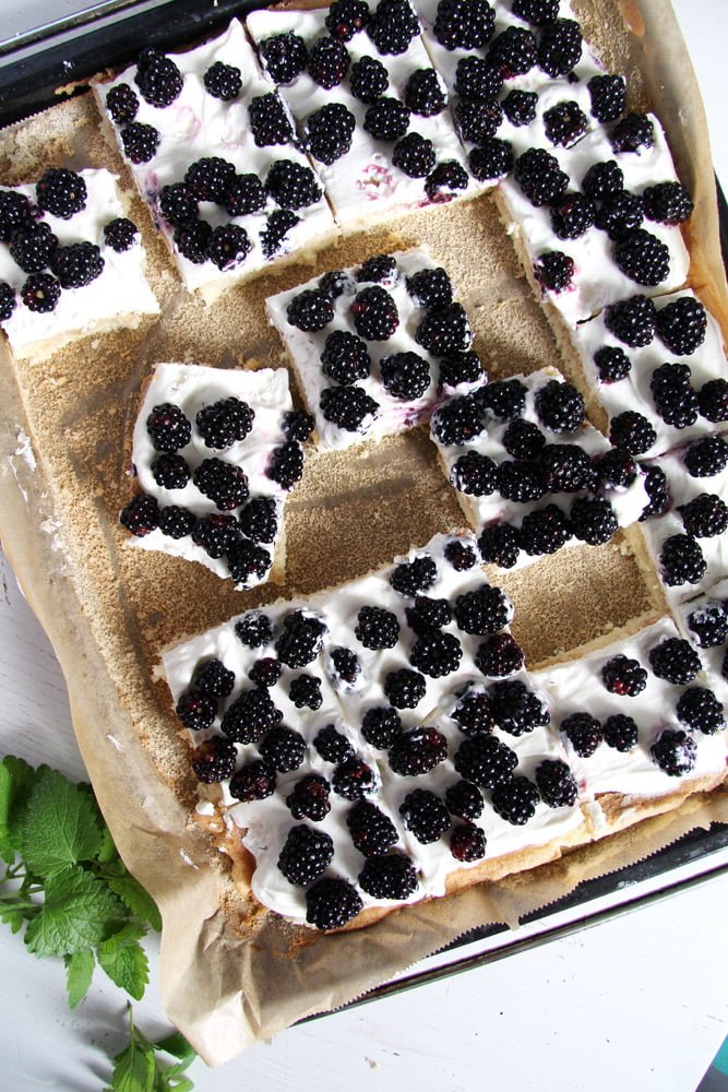 fresh blackberry cake with whipping cream slices