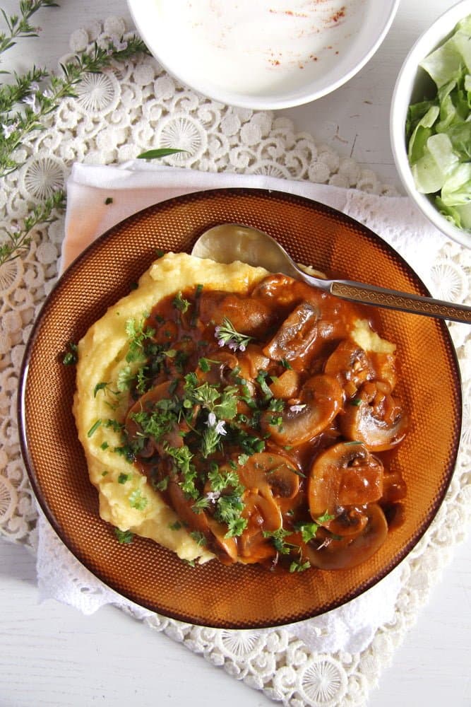 plate of mushroom stew with polenta