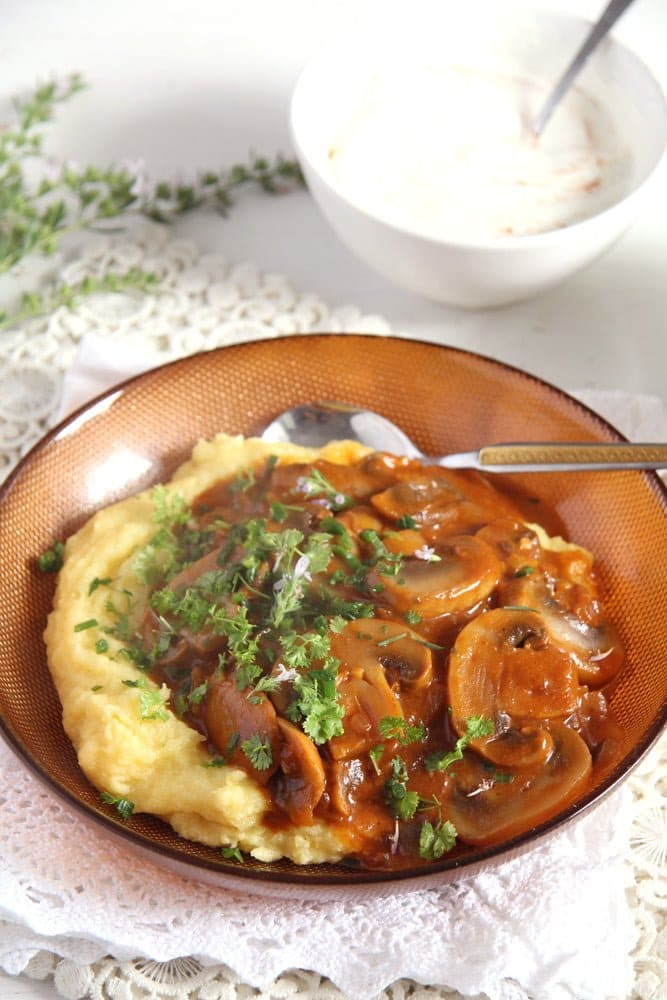 plate of mushroom stew with polenta
