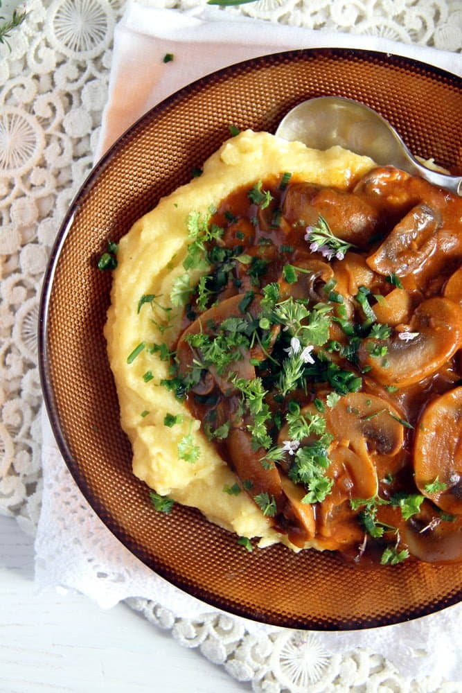 plate of mushroom stew with polenta