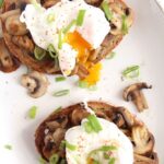garlic mushroom toast with poached eggs