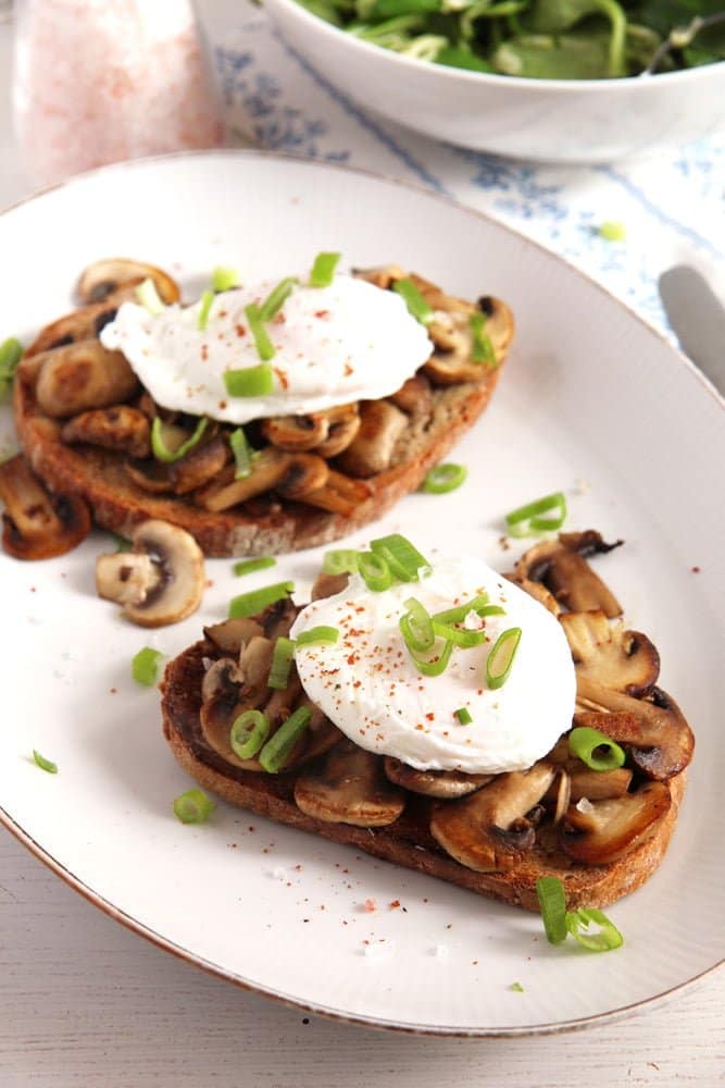 sourdough slice with mushrooms and poached egg