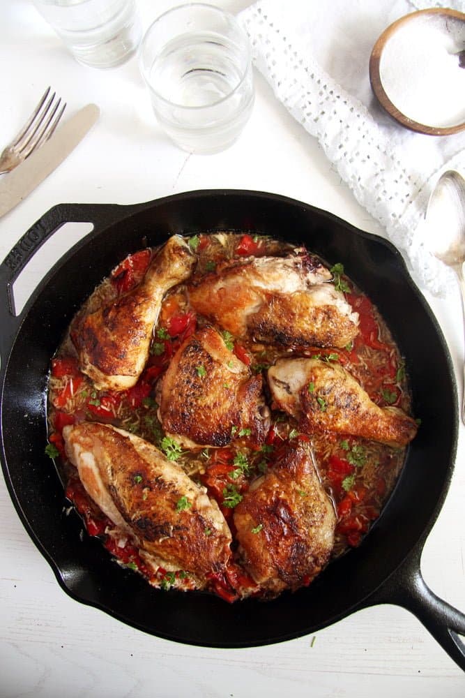 chicken in the skillet with garlic red pepper sauce