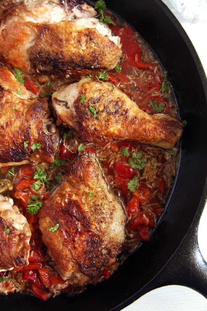 chicken in the skillet with garlic red pepper sauce