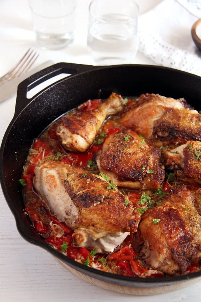 chicken in the skillet with garlic red pepper sauce