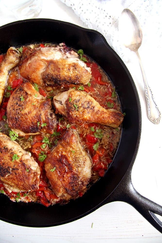 chicken in the skillet with garlic red pepper sauce
