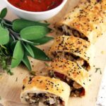 vegetable strudel with yufka dough served with tomato sauce.