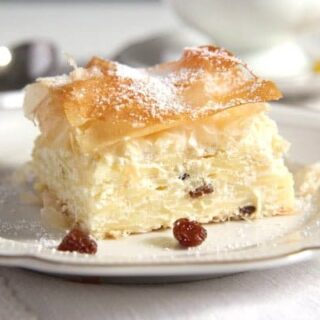 vargabeles hungarian sweet noodle pie with rainsins on a small plate