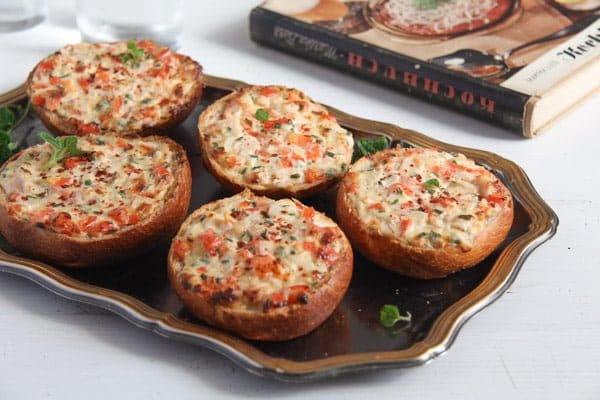 Baked Bread Rolls Topped with Ham and Cheese