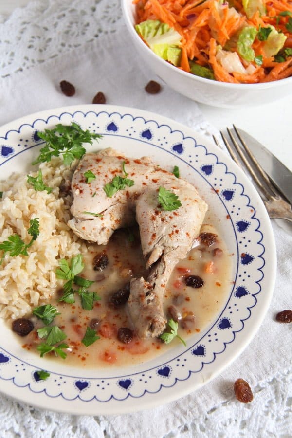 Poached Chicken in White Sauce with Raisins and Rice