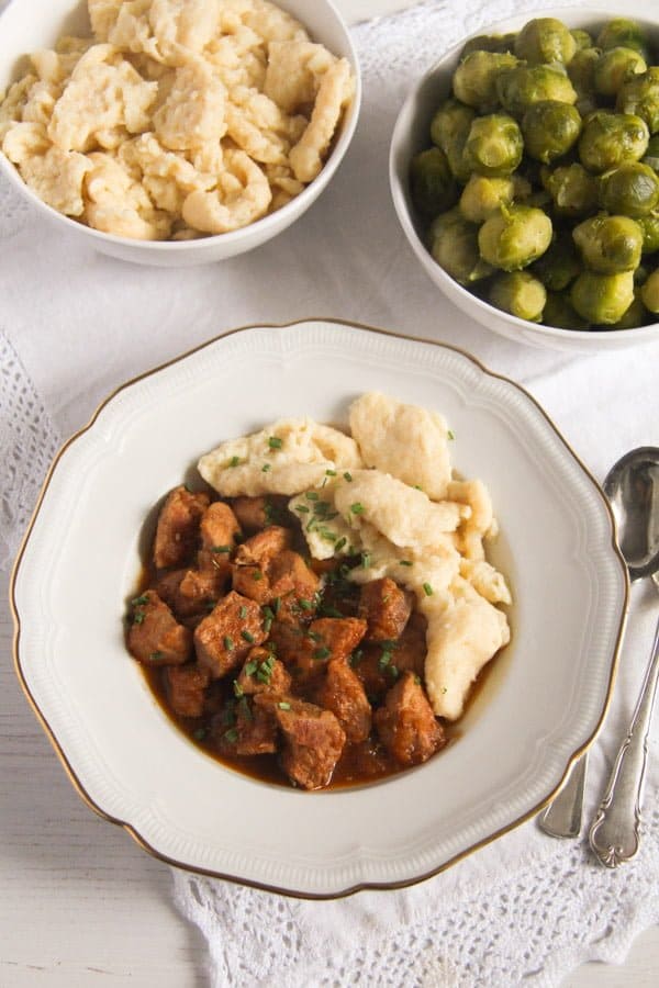 hungarian pörkölt with nokedli - pork stew with dumplings