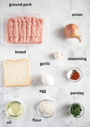 labeled ingredients for making meatballs with pork, white bread, onion, and egg.