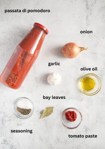 labeled ingredients for making tomato sauce for meatballs.
