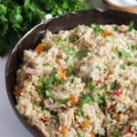 pinterest image with the title romanian chicken pilaf.