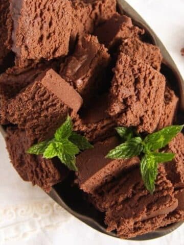 homemade romanian chocolate cut into squares and decorated with mint.