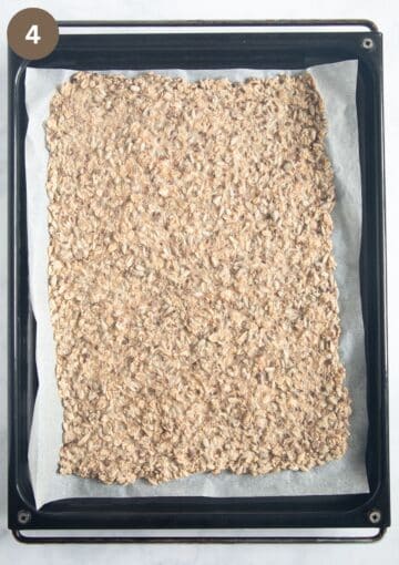 crispbread on a baking sheet halfway through baking.