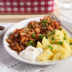 ground pork and cabbage casserole served with boiled potatoes.