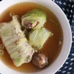 napa cabbage rolls with pork and shrimp served in ginger broth.