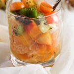 pinterest image with title for christmas fruit salad.