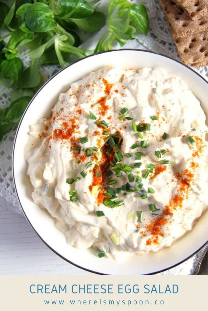 bowl of creamy dip with cheese and leeks