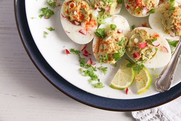 deviled eggs with guacamole filling
