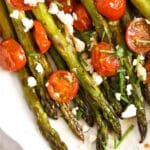 pin image with the title asparagus and cherry tomatoes.