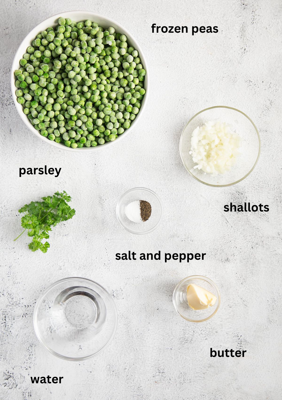 labeled ingredients for cooking peas with butter, parsley, water, shallot, salt and pepper.